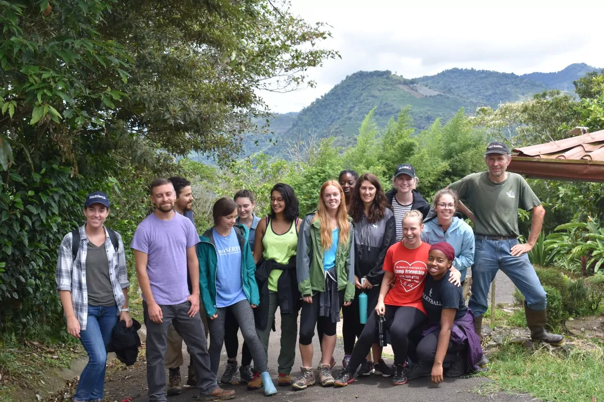 Sustainability students at ICDS stand on farm in Costa Rica