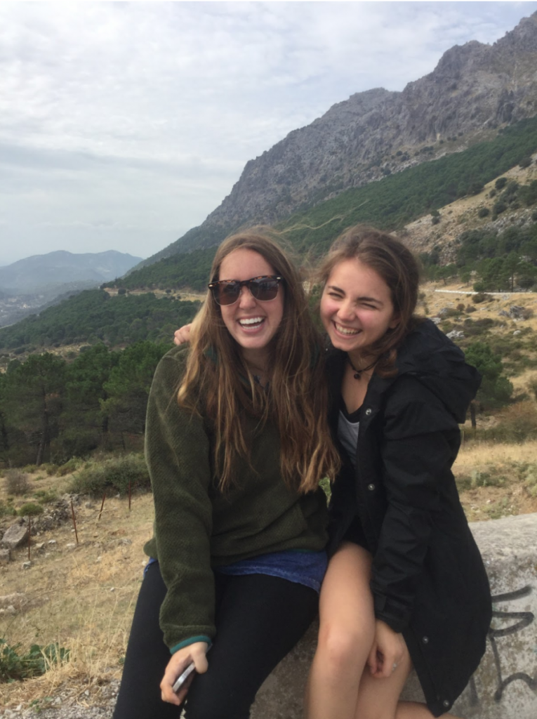 Study abroad students smile on Salamanca Spain hillside