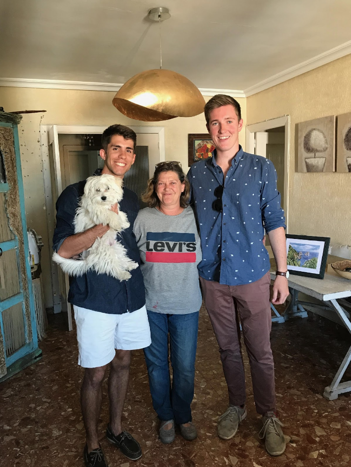 Relationships abroad: study abroad students with host mom and dog