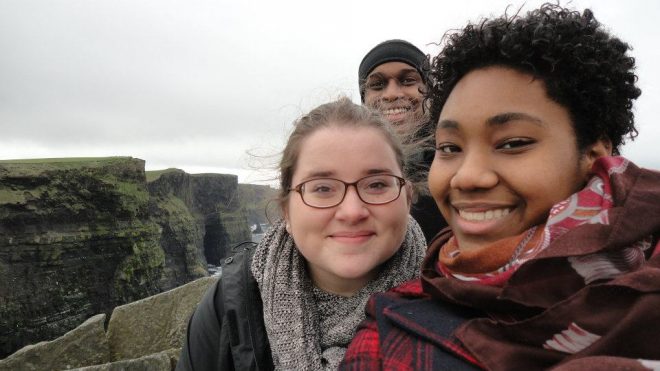 API interns smiling Cliffs of Moher in Dublin