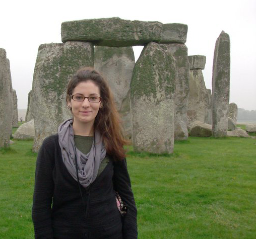 Mary Curtin stands in front of Stonehenge