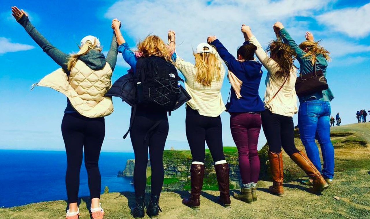 API students overlooking Ireland's Cliffs of Moher