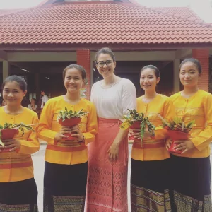 API Teach in Thailand participant, Katie, with a few of her students