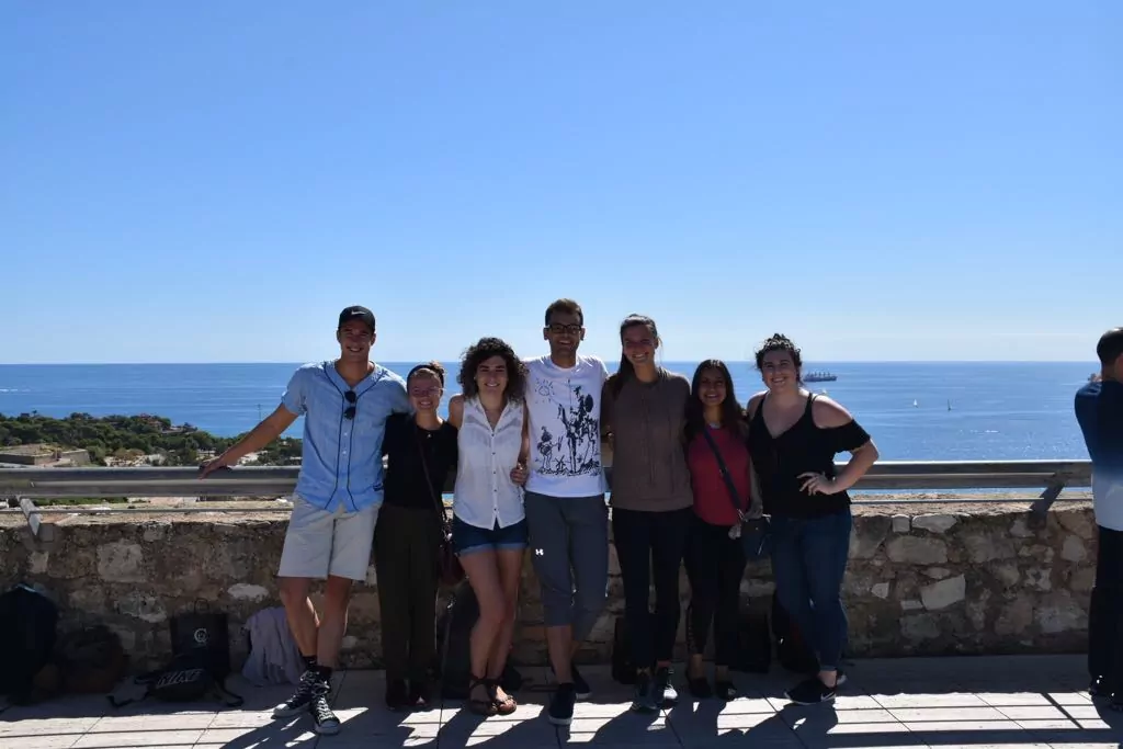 Study abroad students overlook ocean in Barcelona Spain