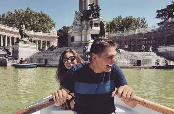 Students rowing boat in Italy